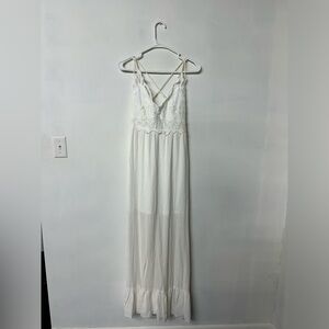 Long white dress with short slip underneath. New with tags. Size small.